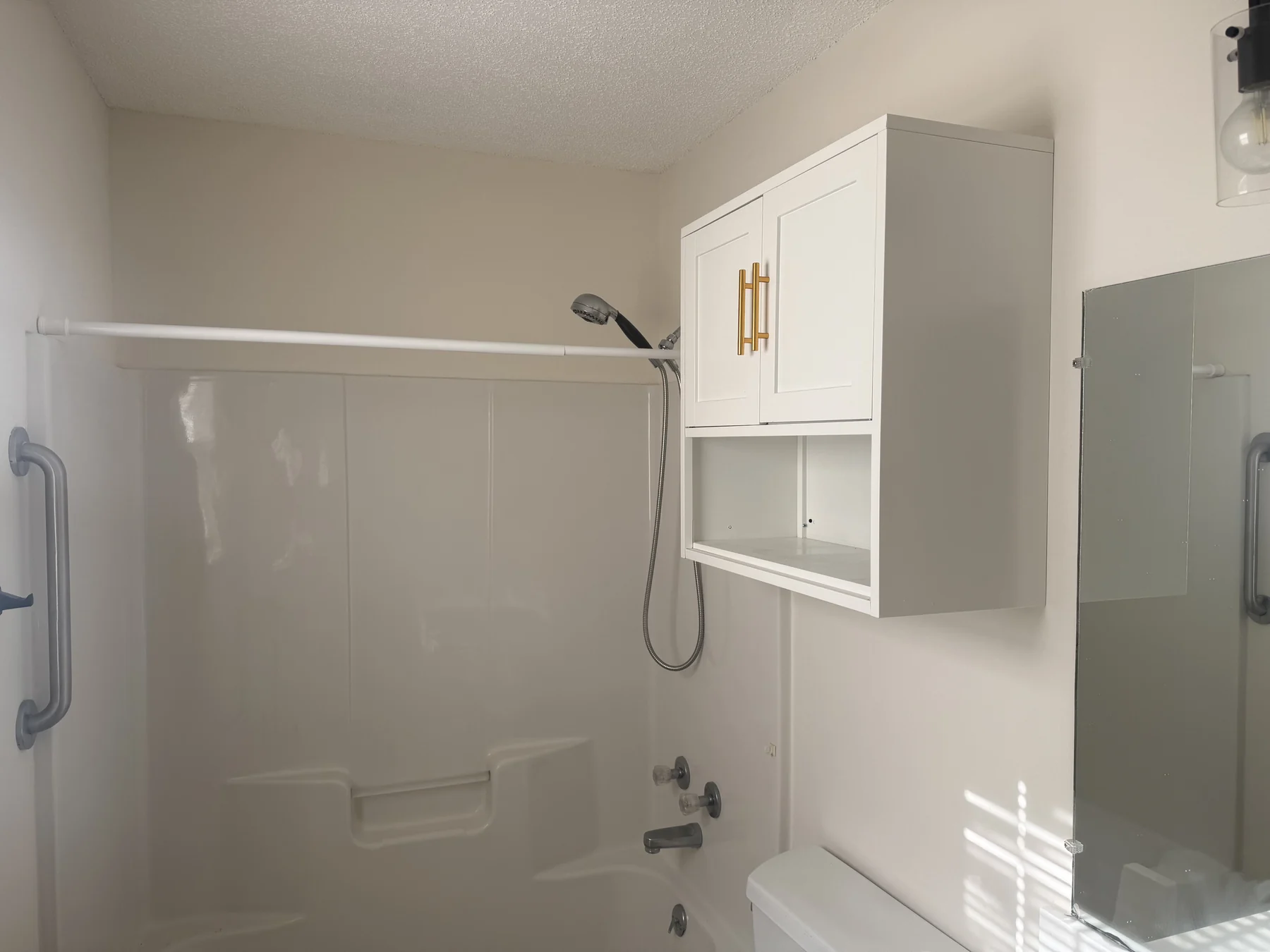 Bathroom tub and storage cabinetry