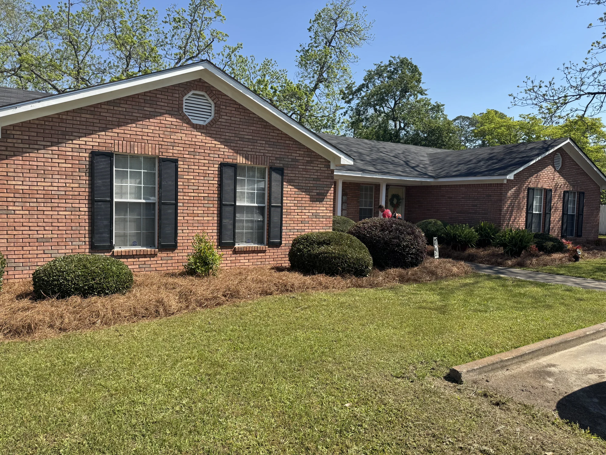 Angled view of a brick West Bennett Estates exterior